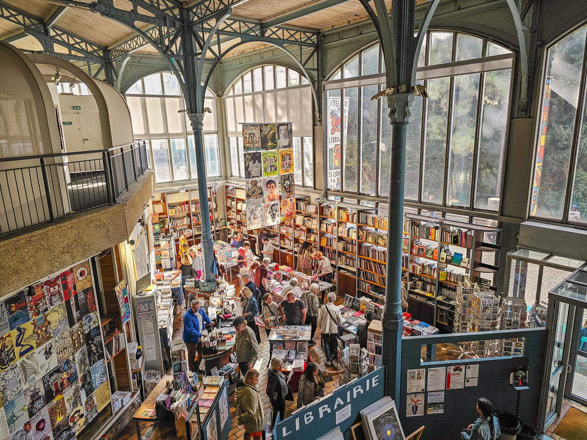 10 Atmospheric Bookstores and Libraries in Paris For Book Lovers